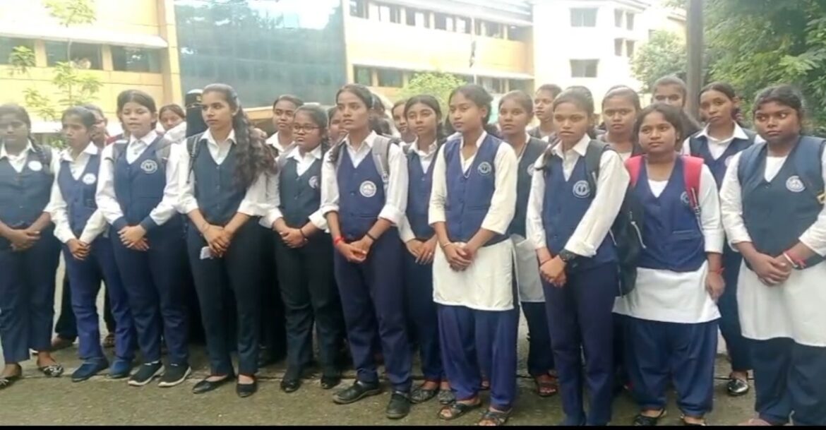 Jamshedpur Women's University students at DC office regarding intermediate section closure.