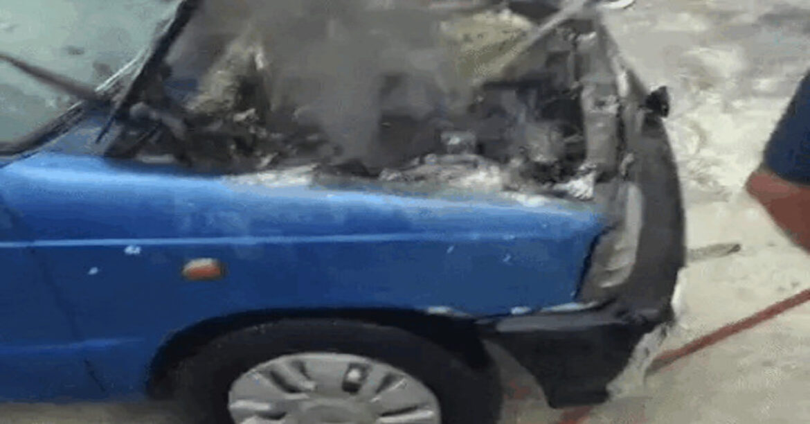 Car catches fire outside Pulse Heart Hospital in Gorakhpur; medical staff extinguishes blaze and rescues occupants.