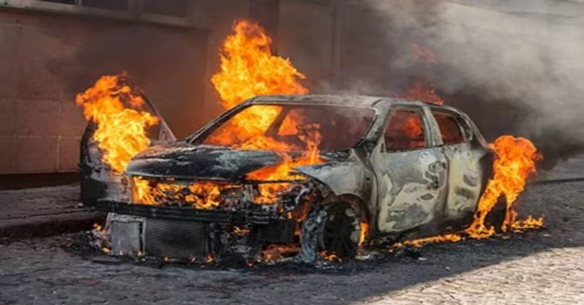 Burnt car after accident in Delhi where trapped driver died in fire