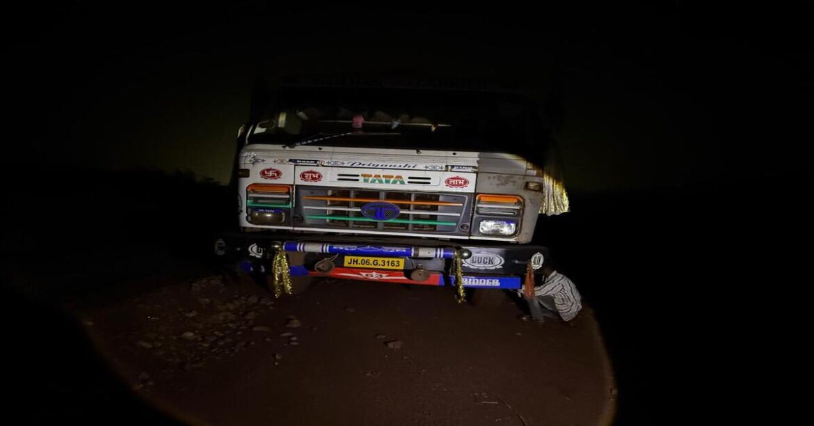 Police seizing dumpers during Madhu Koda-led illegal mining operation in Jharkhand, with arrested suspects in custody.
