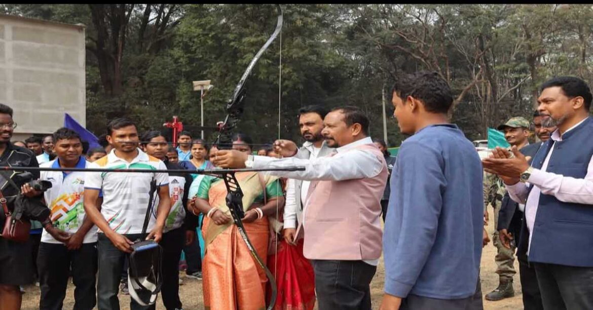 **Alt Text (English):** Minister inaugurating the 8th SR Rungta district-level archery championship in Chaibasa
