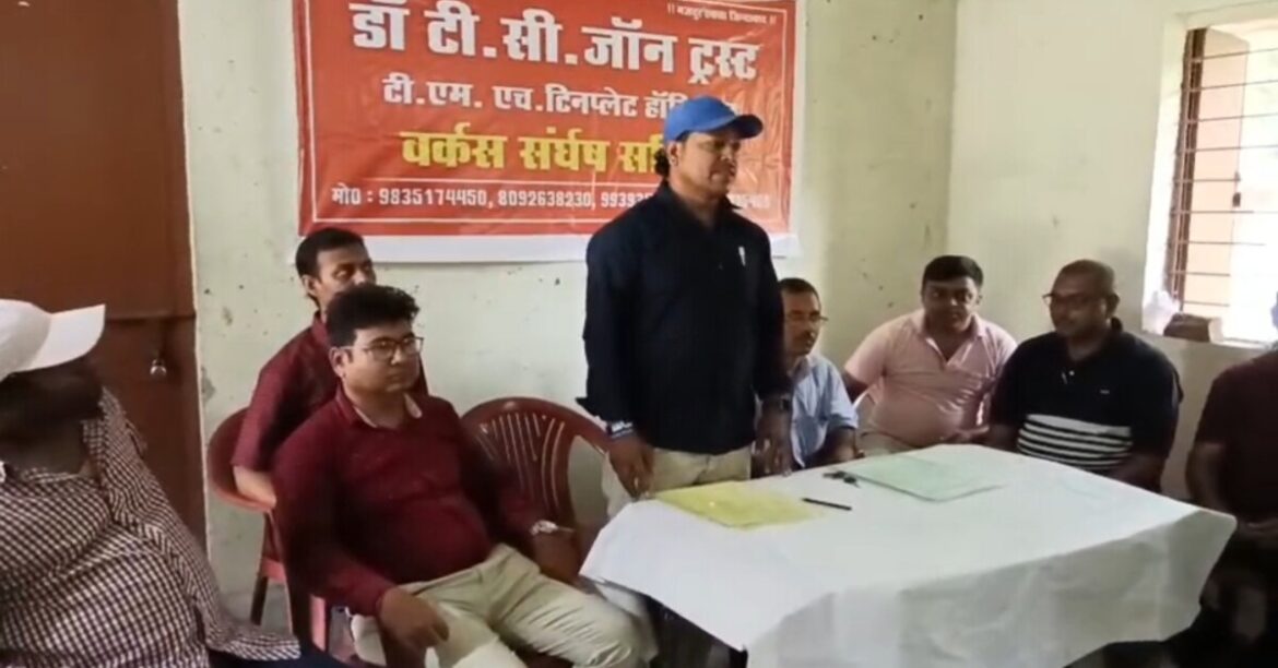 tinplate hospital employee sit in